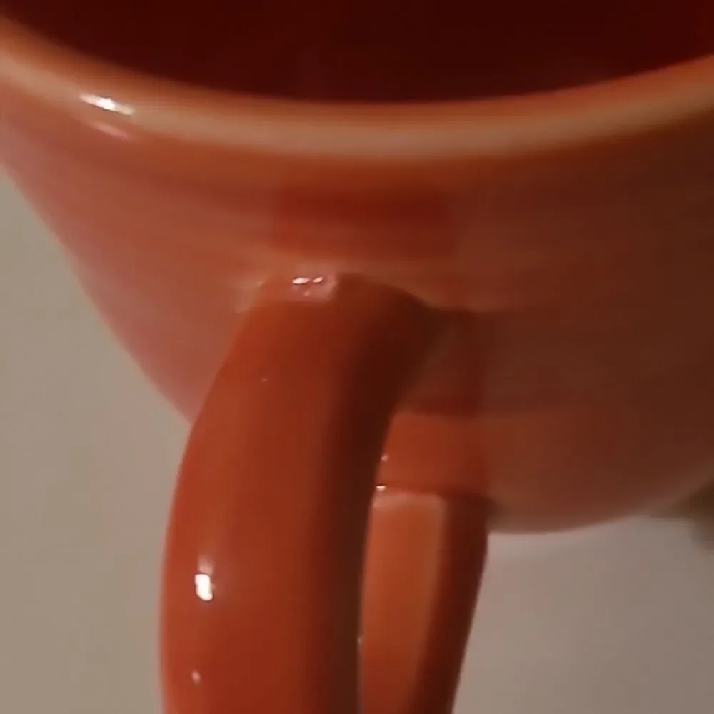 Fiestaware Orange Cup and Saucer Set
